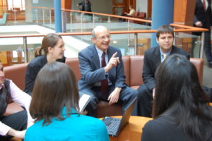 Image of Bill Novelli with students
